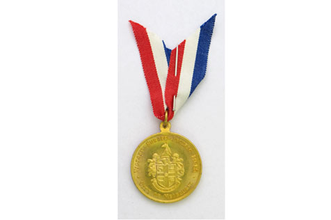 Medal with red, white and blue ribbon
