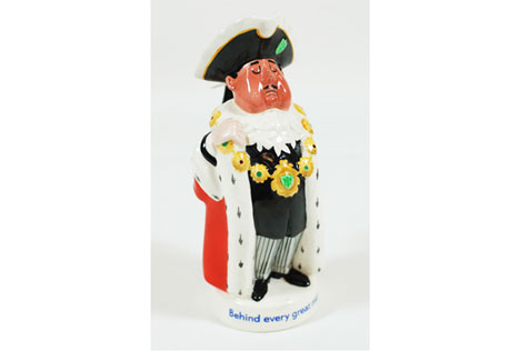 Painted ceramic jug in the image of a robed and moustached mayor