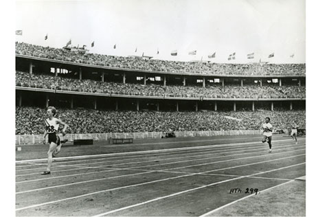 Betty Cuthbert winning the first heat of the 200 metres 29 November 1956
