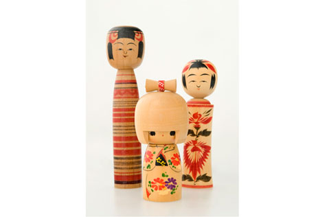 Three painted wooden figurines