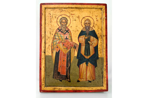 Painted gold wooden panel featuring two priests