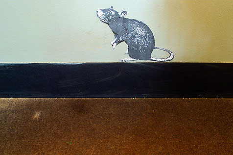 Part of display; poster of a rat