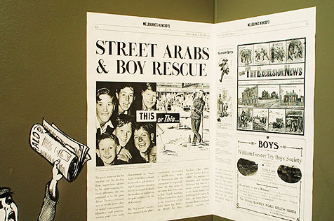 Part of display: newsboy and newspaper