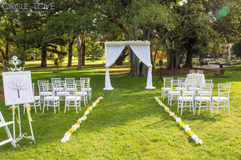 Chairs and tables set up in gardens.