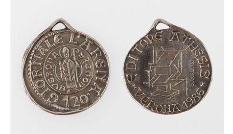 Back and front of silver medal