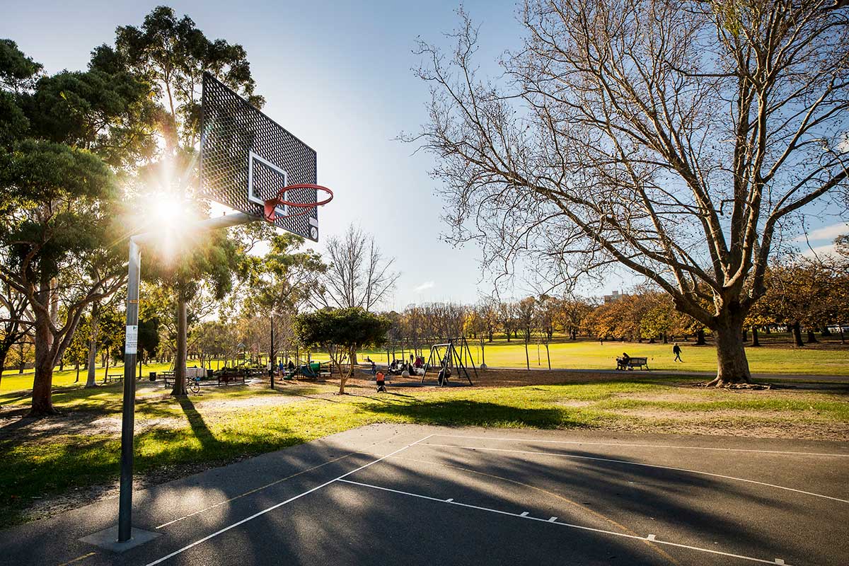 A basketball hoop and court in Fawkner Park