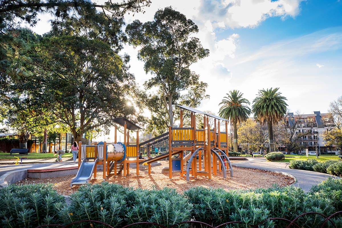 A children's playground in Flagstaff Gardens with small slide, climbing frames and platforms.
