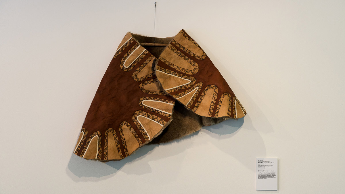 Objects made from pale embossed material on display at Recentre; sisters exhibition