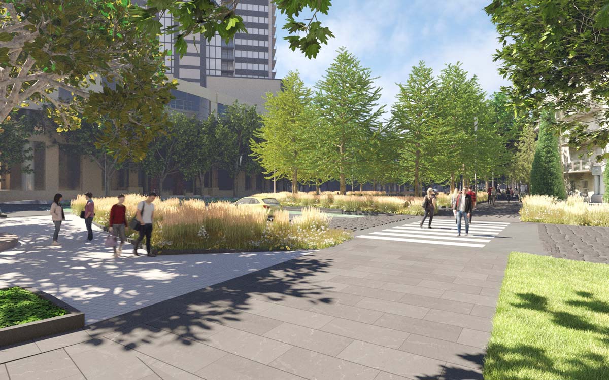 Artist's impression - Paved paths and a pedestrian crossing interspersed with nature strips and clumps of trees