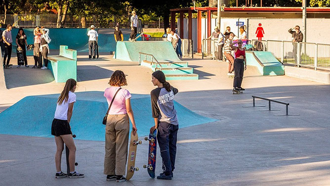 Skatepark with kids skating