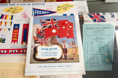 Close-up of 'Premier' flag magazine showing young boy and girl saluting English flag