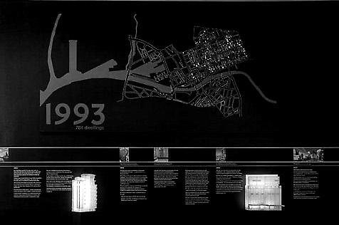 Silver map on black wall dated 1993