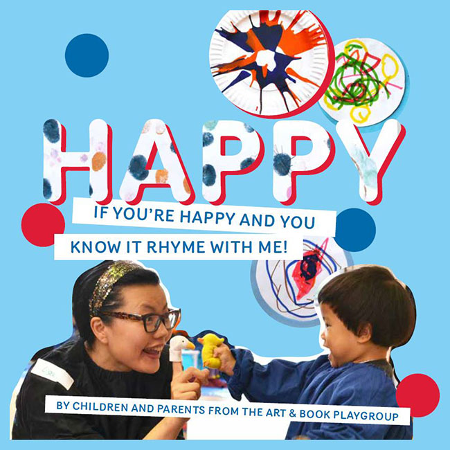 Cover of picture book called 'Happy', showing child and parent playing together