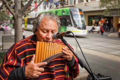 Busker playing panpipes in Bourke Street Mall