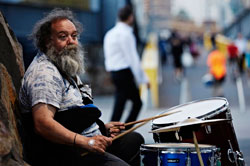 Busker playing drums