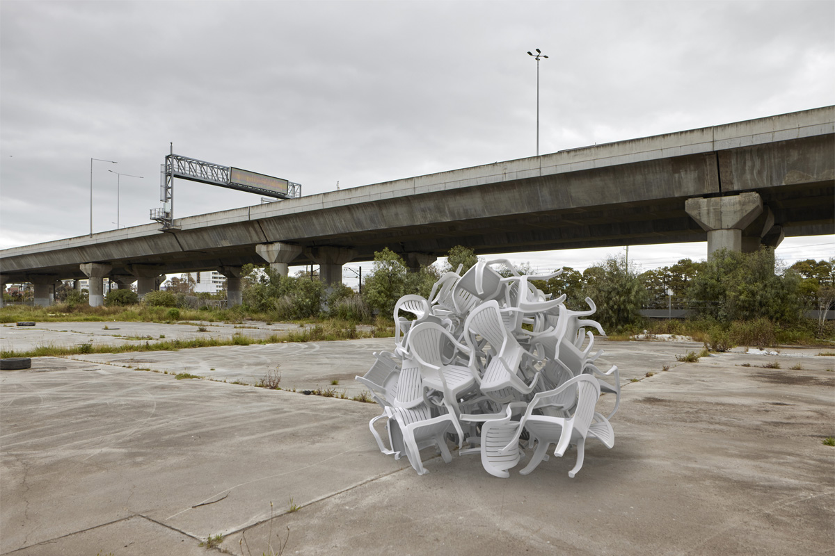 An artist impression of a sculpture made of plastic chairs shaped into a large ball.