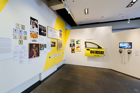 Yellow taxi door mounted on the gallery wall