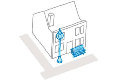 Illustration of a lamp post and seat on the street in front of a house
