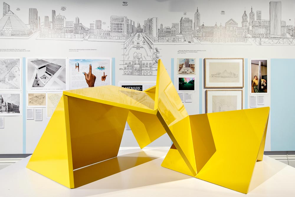 Close view of the scale model of the yellow 'Vault' sculpture