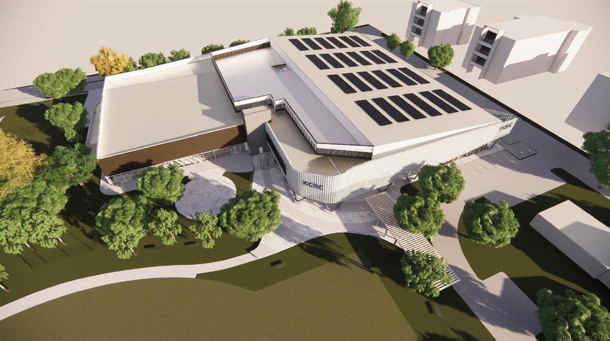 Artist impression of the aerial view of the centre showing its L-shaped footprint and rooftop solar panels.