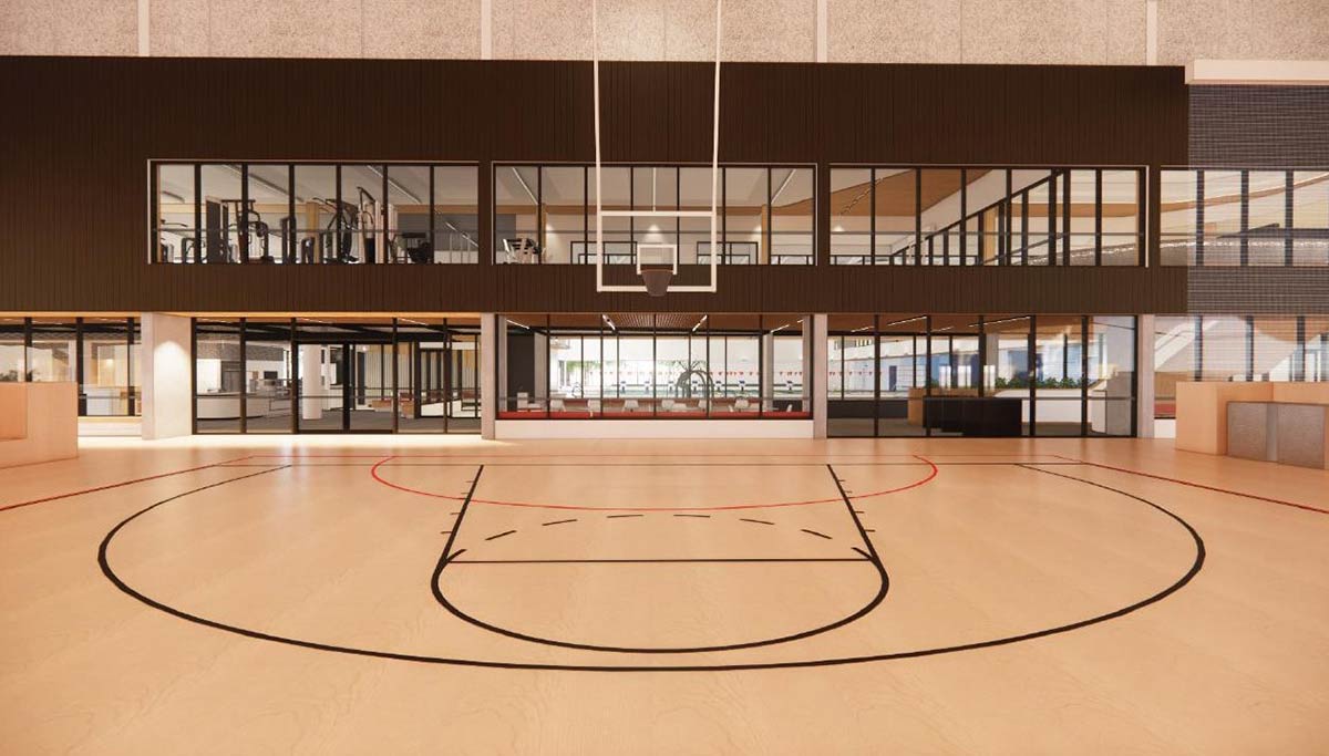Artist impression of the multipurpose court with line markings and rows of windows overlooking the space over two levels.