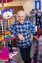 Smiling man in clothing shop