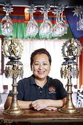 Smiling woman in restaurant
