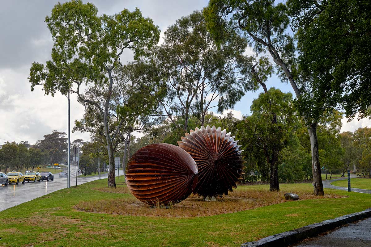 Sculpture of seed pods at the entrance of Royal Park.