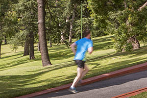A jogger running in Kings Domain
