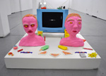 Sculptures of pink heads