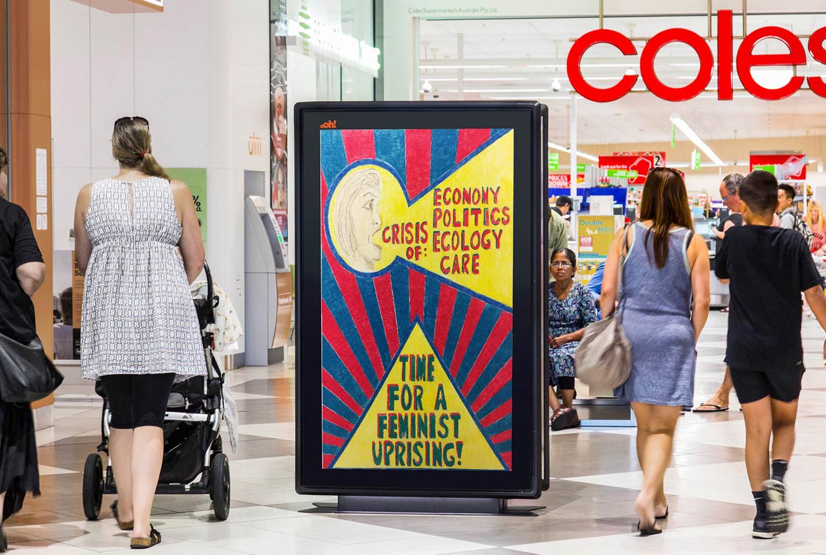 A hand-drawn poster installed in an advertising board inside a shopping centre. The poster depicts a womain proclaiming 'Crisis of: economy, politics, ecology, care. Time for a feminist uprising!'